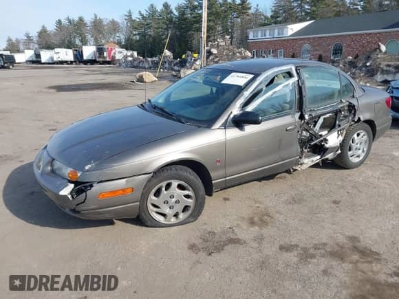 2000 Saturn SL with VIN 1G8ZK5275YZ244530, listed as a IAAI auction lot 41784896 with 50,332 mi miles and . Bid and sale history available at DreamBid. Image 2.