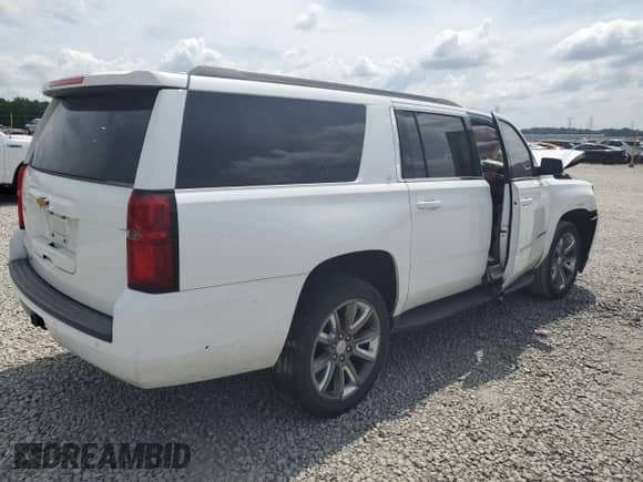 2020 Chevrolet Suburban LT z VIN 1GNSCHKC3LR167806, wystawiony jako Copart lot #59787085 z przebiegiem Nie podano mil oraz Szkoda całkowita • Salvage title. Historia ofert i sprzedaży dostępna na DreamBid. Obrazek 3.