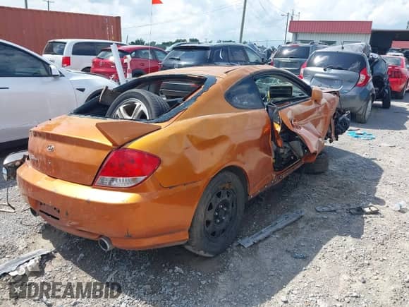 2006 Hyundai Tiburon GT с VIN KMHHN65F66U210071, выставлен на аукционе IAAI как лот 42752874 с пробегом Не указан миль и . История ставок и продаж доступна на DreamBid. Изображение 4.