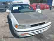 1992 Honda Accord LX z VIN JHMCB7659NC048944, wystawiony jako IAAI lot #41704471 z przebiegiem 253 535 mil mil oraz . Historia ofert i sprzedaży dostępna na DreamBid. Obrazek 6.