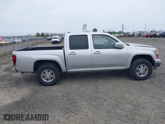 2010 Chevrolet Colorado 1LT z VIN 1GCJTCDEXA8114061, wystawiony jako IAAI lot #42235820 z przebiegiem 218 972 mil mil oraz . Historia ofert i sprzedaży dostępna na DreamBid. Obrazek 14.