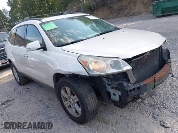 2012 Chevrolet Traverse 1LT z VIN 1GNKVGED6CJ166964, wystawiony jako IAAI lot #42913829 z przebiegiem 132 755 mil mil oraz . Historia ofert i sprzedaży dostępna na DreamBid. Obrazek 1.