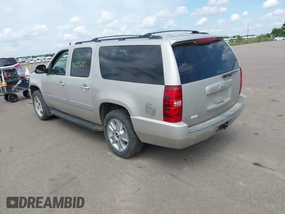 2009 Chevrolet Suburban LTZ z VIN 1GNFK36339R283999, wystawiony jako IAAI lot #42495188 z przebiegiem 203 063 mil mil oraz . Historia ofert i sprzedaży dostępna na DreamBid. Obrazek 3.
