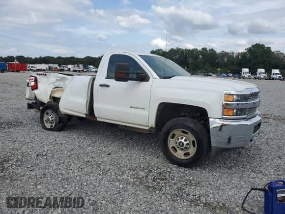 2019 Chevrolet Silverado 2500HD с VIN 1GC0KREG9KF272390, выставлен на аукционе Copart как лот 71787415 с пробегом 105 742 миль миль и Списание • Salvage title. История ставок и продаж доступна на DreamBid. Изображение 4.