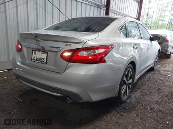 2016 Nissan Altima S with VIN 1N4AL3AP5GC210990, listed as a IAAI auction lot 42198483 with 162,505 mi miles and . Bid and sale history available at DreamBid. Image 4.