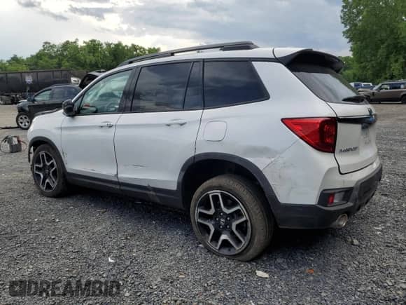 2023 Honda Passport Elite с VIN 5FNYF8H07PB018088, выставлен на аукционе Copart как лот 61335205 с пробегом 44 129 миль миль и Списание • Salvage title. История ставок и продаж доступна на DreamBid. Изображение 2.