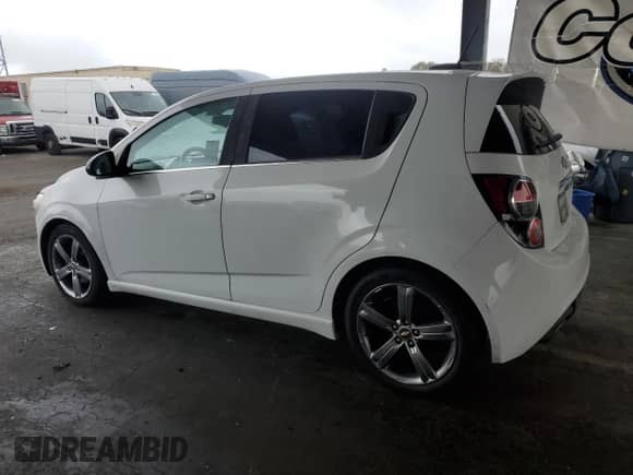2015 Chevrolet Sonic RS with VIN 1G1JG6SB9F4156548, listed as a Copart auction lot 65731035 with 128,098 mi miles and Salvage title. Bid and sale history available at DreamBid. Image 2.