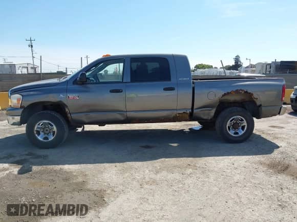 2006 Dodge 3500 Laramie with VIN 3D7LX39C66G141043, listed as a IAAI auction lot 43112125 with 238,475 mi miles and . Bid and sale history available at DreamBid. Image 14.