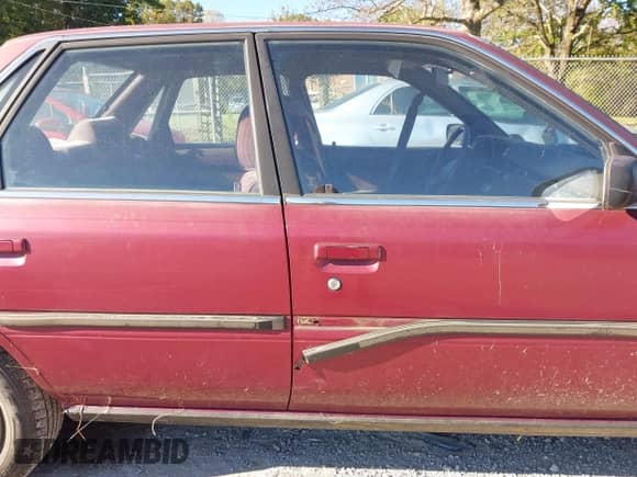 1991 Toyota Camry DLX z VIN 4T1SV21EXMU354893, wystawiony jako IAAI lot #43414642 z przebiegiem 135 939 mil mil oraz . Historia ofert i sprzedaży dostępna na DreamBid. Obrazek 13.