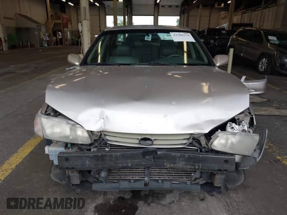 2001 Toyota Camry LE z VIN 4T1BF28K11U960653, wystawiony jako IAAI lot #43200279 z przebiegiem 210 647 mil mil oraz . Historia ofert i sprzedaży dostępna na DreamBid. Obrazek 13.