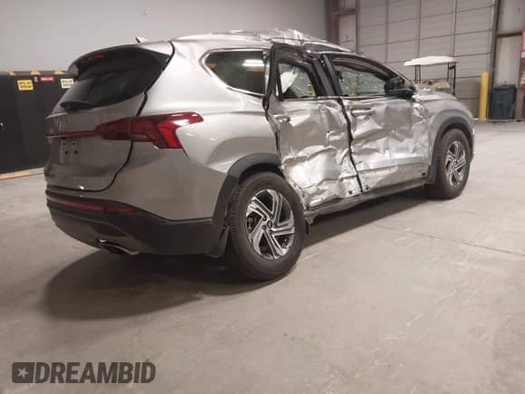 2023 Hyundai Santa Fe SE with VIN 5NMS14AJ6PH648456, listed as a IAAI auction lot 43031344 with 71,840 mi miles and . Bid and sale history available at DreamBid. Image 4.