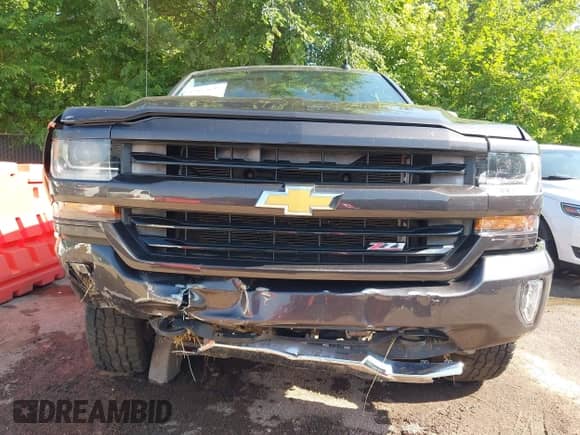 2016 Chevrolet Silverado 1500 LT with VIN 3GCUKRECXGG137939, listed as a IAAI auction lot 42653649 with 122,925 mi miles and . Bid and sale history available at DreamBid. Image 6.