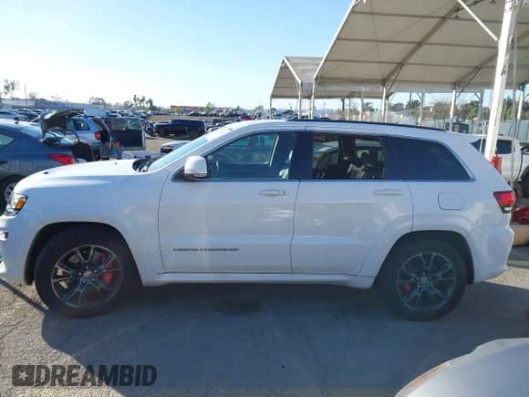 2015 Jeep Grand Cherokee SRT с VIN 1C4RJFDJ2FC115748, выставлен на аукционе IAAI как лот 41323699 с пробегом 64 628 миль миль и . История ставок и продаж доступна на DreamBid. Изображение 13.