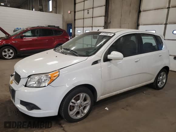 2011 Chevrolet Aveo LS z VIN KL1TD6DE3BB115412, wystawiony jako Copart lot #81599074 z przebiegiem 71 607 mil mil oraz Czysty tytuł • Clean title. Historia ofert i sprzedaży dostępna na DreamBid. Obrazek 1.
