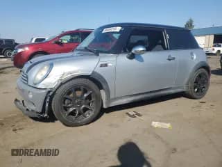 2006 MINI Hardtop S with VIN WMWRE33586TJ37385, listed as a Copart auction lot 86484315 with 78,669 mi miles and Salvage title. Bid and sale history available at DreamBid. Image 1.