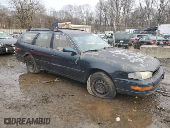 1994 Toyota Camry z VIN 4T1SK12W5RU365849, wystawiony jako Copart lot #44363565 z przebiegiem 226 124 mil mil oraz Szkoda całkowita • Salvage title. Historia ofert i sprzedaży dostępna na DreamBid. Obrazek 4.