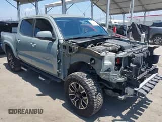 2022 Toyota Tacoma SR5 with VIN 3TMAZ5CN0NM165663, listed as a IAAI auction lot 42367593 with 104,814 mi miles and . Bid and sale history available at DreamBid. Image 1.