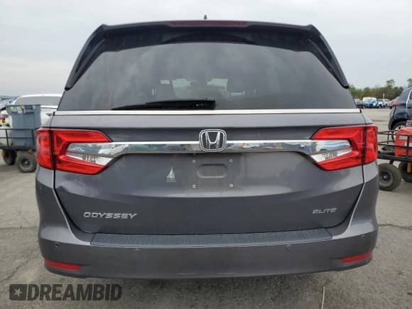 2018 Honda Odyssey Elite z VIN 5FNRL6H99JB098498, wystawiony jako Copart lot #82170395 z przebiegiem 103 313 mil mil oraz Szkoda całkowita • Salvage title. Historia ofert i sprzedaży dostępna na DreamBid. Obrazek 6.