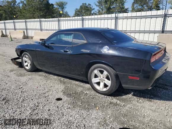 2014 Dodge Challenger SXT z VIN 2C3CDYAG5EH229969, wystawiony jako Copart lot #85288785 z przebiegiem 194 859 mil mil oraz Szkoda całkowita • Salvage title. Historia ofert i sprzedaży dostępna na DreamBid. Obrazek 2.