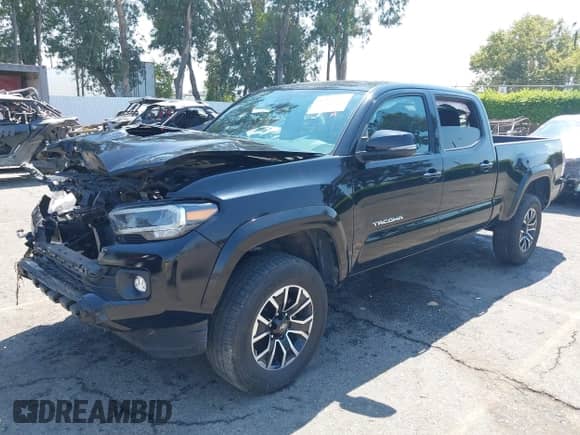 2023 Toyota Tacoma SR5 z VIN 3TMDZ5BN7PM148621, wystawiony jako IAAI lot #42928723 z przebiegiem 70 708 mil mil oraz . Historia ofert i sprzedaży dostępna na DreamBid. Obrazek 17.