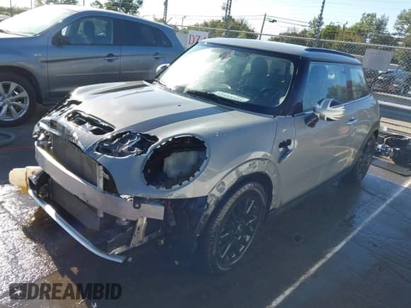 2017 MINI Hardtop Cooper S with VIN WMWXP7C51H3B93957, listed as a IAAI auction lot 43415354 with 72,375 mi miles and . Bid and sale history available at DreamBid. Image 2.