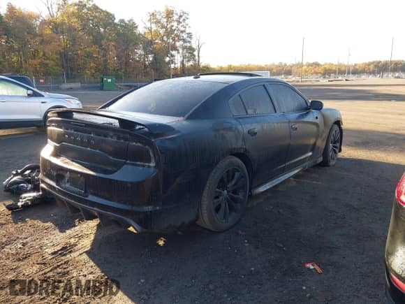 2013 Dodge Charger SRT-8 z VIN 2C3CDXEJ1DH534853, wystawiony jako IAAI lot #43490988 z przebiegiem Nie podano mil oraz . Historia ofert i sprzedaży dostępna na DreamBid. Obrazek 4.