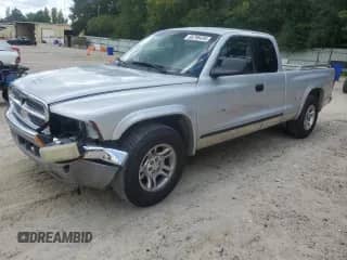 2002 Dodge Dakota SLT with VIN 1B7GL42X32S507859, listed as a Copart auction lot 66798495 with 122,591 mi miles and Salvage title. Bid and sale history available at DreamBid. Image 1.