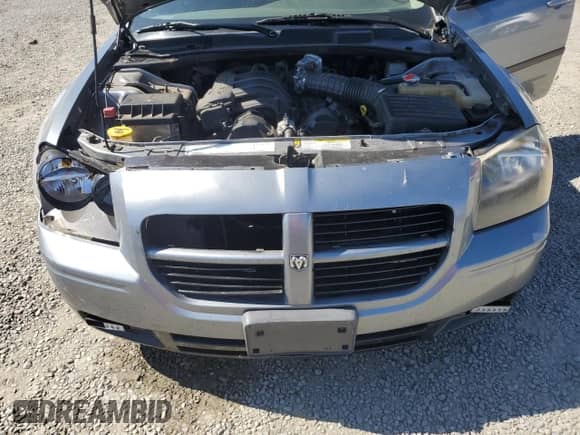 2006 Dodge Magnum z VIN 2D4FV47T86H517282, wystawiony jako Copart lot #63332685 z przebiegiem 191 684 mil mil oraz Szkoda całkowita • Salvage title. Historia ofert i sprzedaży dostępna na DreamBid. Obrazek 11.