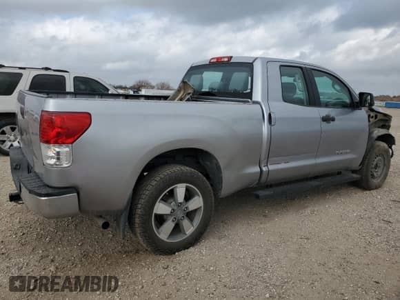 2012 Toyota Tundra z VIN 5TFRU5F13CX027956, wystawiony jako Copart lot #43580265 z przebiegiem 156 862 mil mil oraz Szkoda całkowita • Salvage title. Historia ofert i sprzedaży dostępna na DreamBid. Obrazek 3.