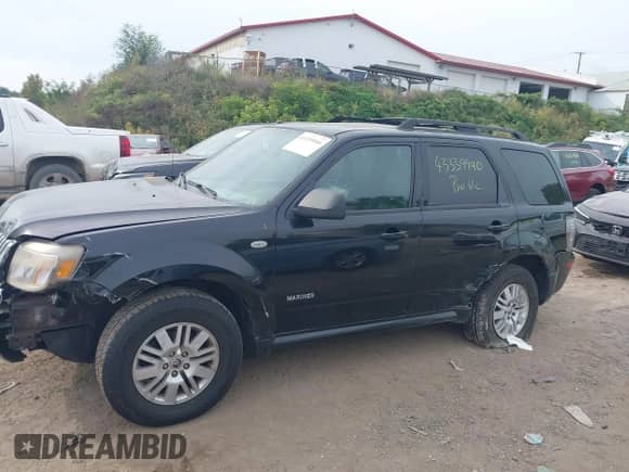 2008 Mercury Mariner with VIN 4M2CU91108KJ51427, listed as a IAAI auction lot 43339990 with 227,044 mi miles and . Bid and sale history available at DreamBid. Image 14.