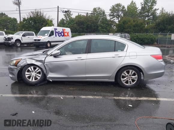2010 Honda Accord LX-P with VIN 1HGCP2F47AA031337, listed as a IAAI auction lot 43327279 with 244,085 mi miles and . Bid and sale history available at DreamBid. Image 14.