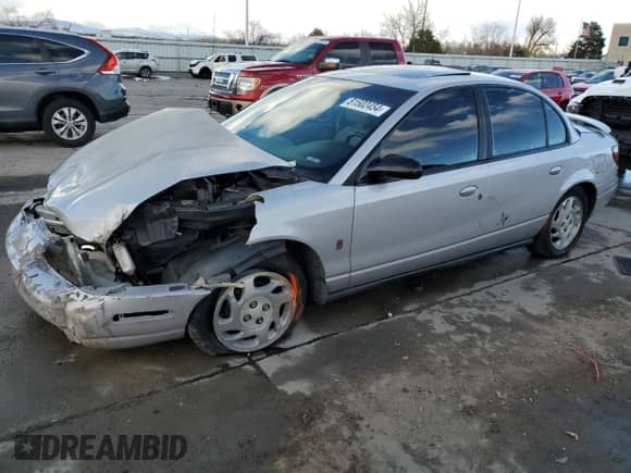 2000 Saturn SL with VIN 1G8ZJ5273YZ173525, listed as a Copart auction lot 81502454 with Not provided miles and Salvage title. Bid and sale history available at DreamBid. Image 1.