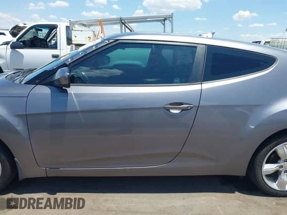 2015 Hyundai Veloster with VIN KMHTC6AD6FU239445, listed as a IAAI auction lot 42757675 with 114,509 mi miles and . Bid and sale history available at DreamBid. Image 14.