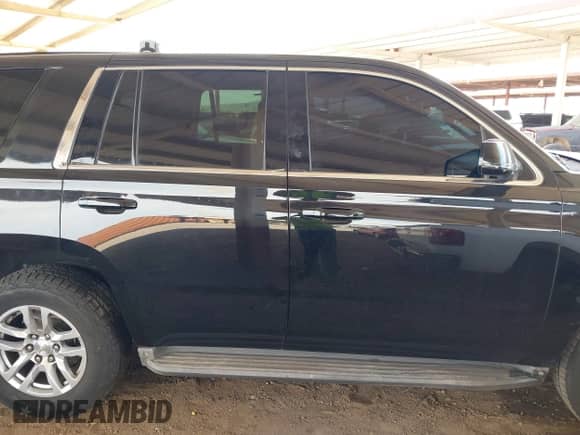 2015 Chevrolet Tahoe Commercial with VIN 1GNLC2EC0FR629983, listed as a IAAI auction lot 41917584 with 111,461 mi miles and . Bid and sale history available at DreamBid. Image 13.