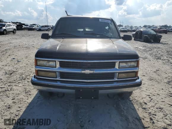 1999 Chevrolet Tahoe Z71 z VIN 1GNEK13R1XJ380316, wystawiony jako Copart lot #68505524 z przebiegiem 242 542 mil mil oraz Szkoda całkowita • Salvage title. Historia ofert i sprzedaży dostępna na DreamBid. Obrazek 5.