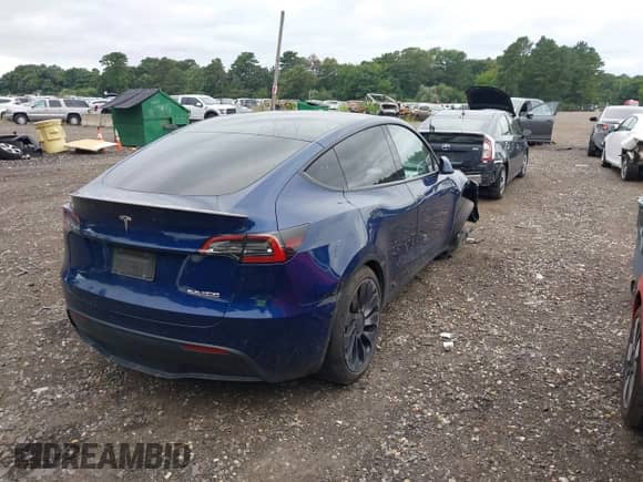 2022 Tesla Model Y Performance z VIN 7SAYGDEF1NF381579, wystawiony jako IAAI lot #42907318 z przebiegiem 78 749 mil mil oraz . Historia ofert i sprzedaży dostępna na DreamBid. Obrazek 4.