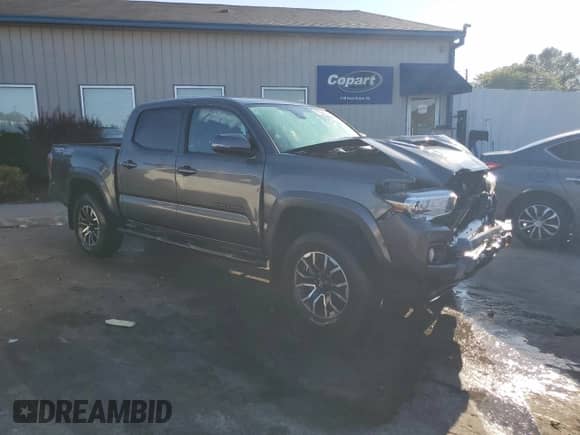 2021 Toyota Tacoma SR with VIN 3TMCZ5AN6MM394116, listed as a Copart auction lot 71531095 with 32,096 mi miles and Salvage title. Bid and sale history available at DreamBid. Image 4.