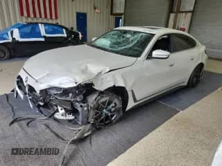 2025 BMW i4 xDrive40 with VIN WBY43HD09SFT98390, listed as a Copart auction lot 62848255 with Not provided miles and Salvage title. Bid and sale history available at DreamBid. Image 1.