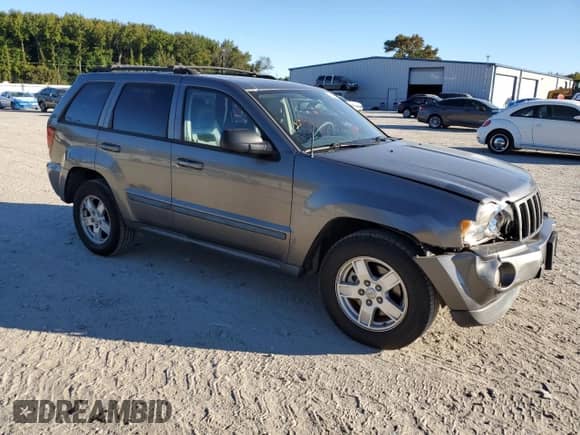 2007 Jeep Grand Cherokee Laredo с VIN 1J8GR48K57C652163, выставлен на аукционе Copart как лот 87011945 с пробегом 131 893 миль миль и Списание • Salvage title. История ставок и продаж доступна на DreamBid. Изображение 4.