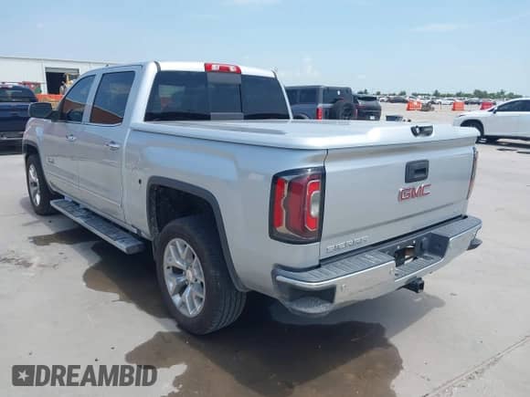 2018 GMC Sierra 1500 SLT z VIN 3GTP1NECXJG347361, wystawiony jako IAAI lot #42897583 z przebiegiem 166 607 mil mil oraz . Historia ofert i sprzedaży dostępna na DreamBid. Obrazek 3.