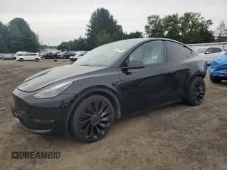 2023 Tesla Model Y Performance z VIN 7SAYGDEF0PF802727, wystawiony jako Copart lot #82114845 z przebiegiem 31 950 mil mil oraz Szkoda całkowita • Salvage title. Historia ofert i sprzedaży dostępna na DreamBid. Obrazek 1.