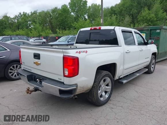 2017 Chevrolet Silverado 1500 LTZ with VIN 3GCUKSEC7HG321180, listed as a IAAI auction lot 42161710 with 148,959 mi miles and . Bid and sale history available at DreamBid. Image 4.