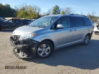 2015 Toyota Sienna LE with VIN 5TDKK3DC0FS676737, listed as a Copart auction lot 84865145 with 273,367 mi miles and Salvage title. Bid and sale history available at DreamBid. Image 1.