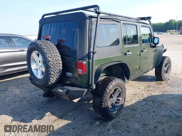 2007 Jeep Wrangler Unlimited X с VIN 1J4GA39197L115109, выставлен на аукционе IAAI как лот 42582190 с пробегом 141 080 миль миль и . История ставок и продаж доступна на DreamBid. Изображение 4.