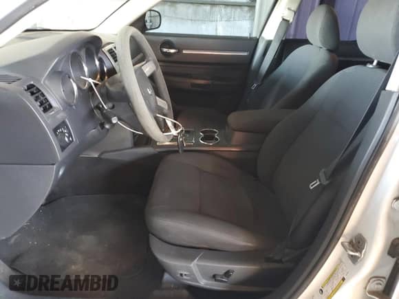 2010 Dodge Charger SXT with VIN 2B3CA3CV0AH290595, listed as a Copart auction lot 73893904 with 127,733 mi miles and Salvage title. Bid and sale history available at DreamBid. Image 7.