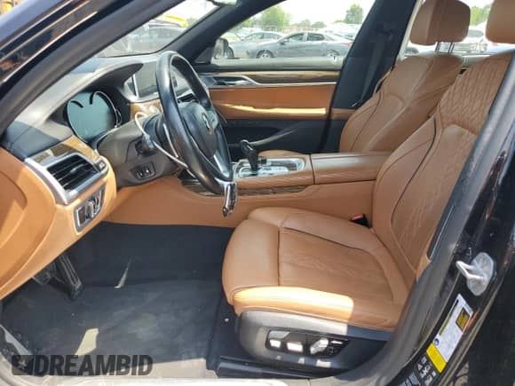 2019 BMW 7 Series 750i xDrive с VIN WBA7F2C53KB239174, выставлен на аукционе Copart как лот 59283255 с пробегом 125 610 миль миль и Списание • Salvage title. История ставок и продаж доступна на DreamBid. Изображение 7.