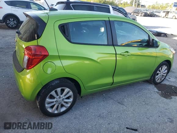 2016 Chevrolet Spark LT with VIN KL8CD6SA6GC587803, listed as a Copart auction lot 84641025 with 77,091 mi miles and Salvage title. Bid and sale history available at DreamBid. Image 3.