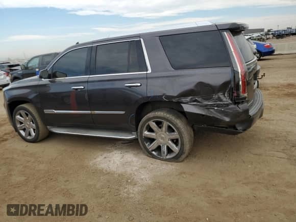 2015 Cadillac Escalade Luxury with VIN 1GYS4BKJ7FR174077, listed as a Copart auction lot 68317665 with 107,903 mi miles and Salvage title. Bid and sale history available at DreamBid. Image 2.