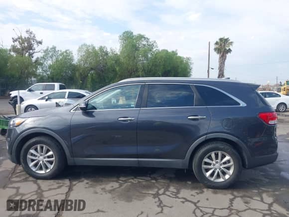 2018 Kia Sorento LX with VIN 5XYPG4A38JG348635, listed as a IAAI auction lot 42778952 with 97,343 mi miles and . Bid and sale history available at DreamBid. Image 15.