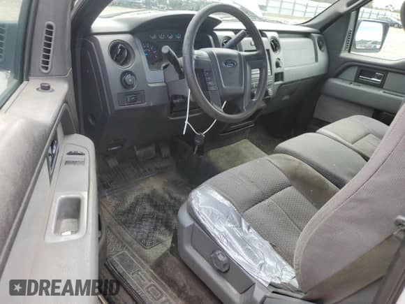 2014 Ford F-150 XL с VIN 1FTNF1CF7EKD17182, выставлен на аукционе Copart как лот 81990855 с пробегом 125 257 миль миль и Списание • Salvage title. История ставок и продаж доступна на DreamBid. Изображение 8.